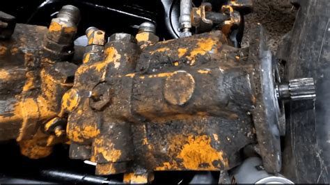 how to remove hydraulic drive pump on 1845c skid steer|open hydraulic pump on case 1845.